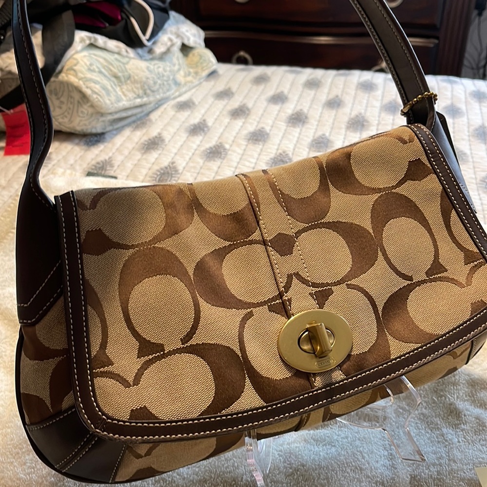 NWOT.  Leather and canvas . Impeccable condition .